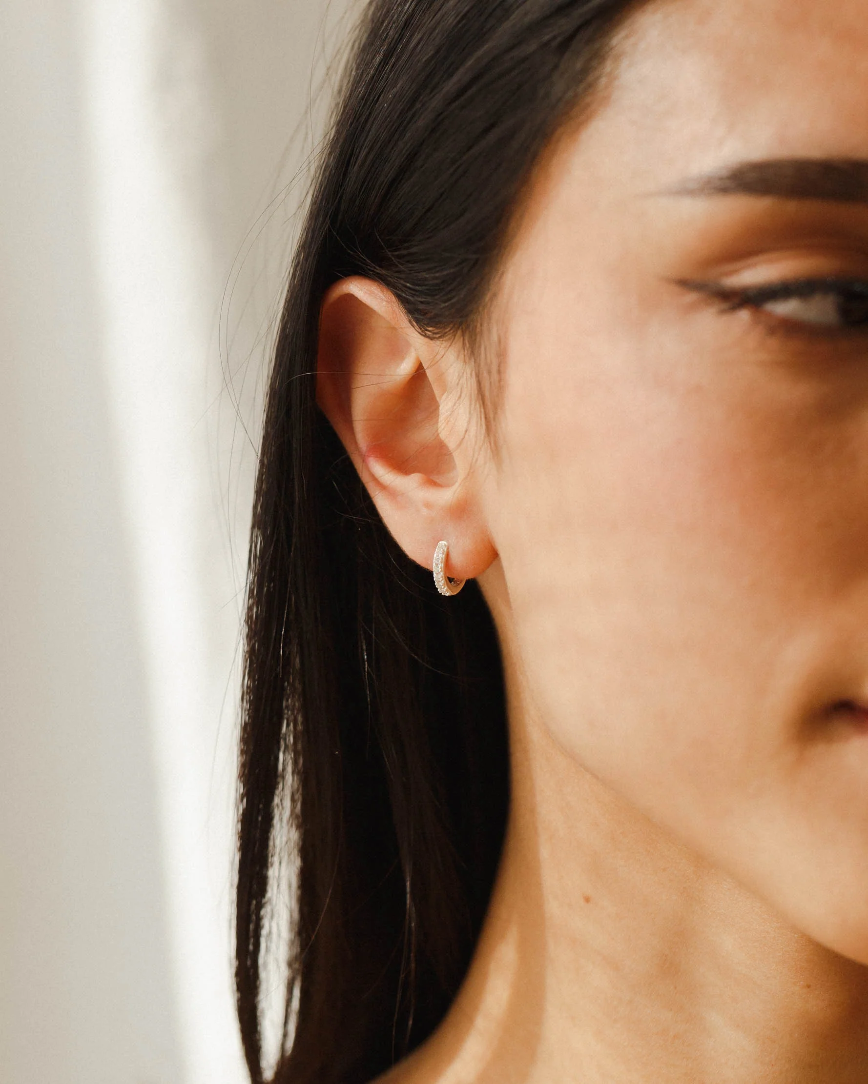 Olivia White Sapphire Huggie Hoops - Image 3